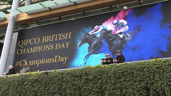 British Champions Day creative poster at Ascot with two horses and jockeys and paint burst effect. Earnie creative design